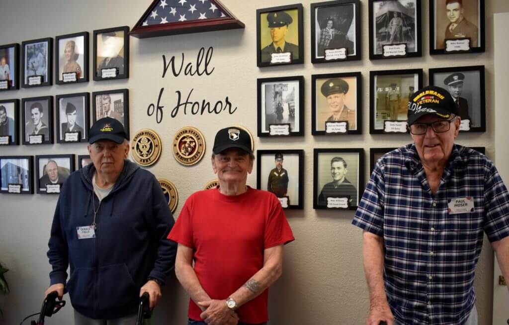 Carlton Senior Living resident, Paul Moser, poses with fellow veterans in Pleasant Hill.